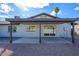 Covered patio with sliding glass doors and views of the backyard at 2112 E Fremont E Dr, Tempe, AZ 85282