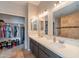 Bathroom with double vanity, quartz countertops, and walk-in shower at 2217 E Devon Ct, Gilbert, AZ 85296