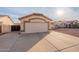 House exterior view showing the garage and driveway at 2217 E Devon Ct, Gilbert, AZ 85296