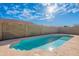 This tranquil backyard pool offers a refreshing escape on warm days at 2217 E Devon Ct, Gilbert, AZ 85296