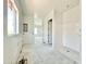 Bright bathroom with a clean and modern design, showcasing a shower area and fixtures at 22708 E Lords Way, Queen Creek, AZ 85142