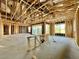 Interior framing of living room, under construction at 22708 E Lords Way, Queen Creek, AZ 85142