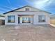 Exterior view of home featuring covered patio and space for a pool overlooking a spacious backyard at 22740 E Lords Way, Queen Creek, AZ 85142