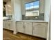 Kitchen counter featuring a window with tile backsplash at 22740 E Lords Way, Queen Creek, AZ 85142