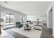 Open concept living room with a view into the kitchen at 22910 E Alyssa Rd, Queen Creek, AZ 85142