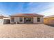 Charming home with a spacious backyard and gravel landscaping at 2355 N Oakmont Ln, Casa Grande, AZ 85122