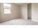 Inviting bedroom including carpet and natural light at 24153 W Hilton Ave, Buckeye, AZ 85326
