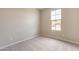 Simple bedroom, including carpeted floors and natural light at 24153 W Hilton Ave, Buckeye, AZ 85326