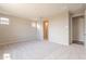 The carpeted main bedroom is spacious and has two windows for natural light at 24153 W Hilton Ave, Buckeye, AZ 85326