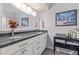 Elegant bathroom with granite double vanity and large mirror at 25227 S Mohawk Dr, Sun Lakes, AZ 85248