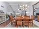 Bright dining area with hardwood floors and large windows at 25227 S Mohawk Dr, Sun Lakes, AZ 85248