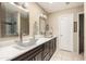 Elegant bathroom with double sinks and large walk-in shower at 25432 S Queen Palm Dr, Sun Lakes, AZ 85248