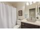 Clean bathroom with updated vanity and shower/tub combo at 25432 S Queen Palm Dr, Sun Lakes, AZ 85248