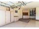 Well-organized garage with ample storage cabinets, a practical and functional space at 25440 S Flame Tree Dr, Sun Lakes, AZ 85248