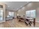 Spacious dining area with a large wooden table and a play area at 25802 N Hackberry Dr, Phoenix, AZ 85083