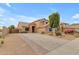 Two-story house with desert landscaping and a gated driveway at 25802 N Hackberry Dr, Phoenix, AZ 85083