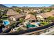 Aerial view showing home with pool and desert landscape at 26907 N 51St Dr, Phoenix, AZ 85083