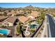 Aerial view of home, pool, and surrounding neighborhood at 26907 N 51St Dr, Phoenix, AZ 85083