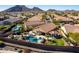 Aerial view of the house and surrounding neighborhood at 26907 N 51St Dr, Phoenix, AZ 85083