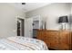 Bedroom with a dresser and patterned bedding at 26907 N 51St Dr, Phoenix, AZ 85083