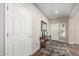 Bright entryway with tile flooring, console table, and mirror at 26907 N 51St Dr, Phoenix, AZ 85083