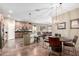 Kitchen with island, stainless steel appliances, and dining area view at 26907 N 51St Dr, Phoenix, AZ 85083