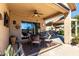 Covered patio with dining table and mountain views at 26907 N 51St Dr, Phoenix, AZ 85083