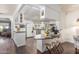 Kitchen with white cabinets, granite counters and island at 2724 N Wright Way, Mesa, AZ 85215