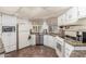 Well-equipped kitchen, featuring white cabinets and appliances at 2724 N Wright Way, Mesa, AZ 85215