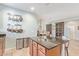 Kitchen island with granite countertop and seating for two at 2981 E Nighthawk Way, Phoenix, AZ 85048