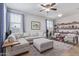 L-shaped sofa, ottoman, and built-in shelving at 2981 E Nighthawk Way, Phoenix, AZ 85048