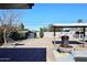 Landscaped backyard with a fountain and seating area at 3502 N 22 St, Phoenix, AZ 85016