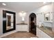 Bathroom with granite vanity and large mirror at 3502 N 22 St, Phoenix, AZ 85016