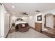 Main bedroom with comfy seating area and ceiling fan at 3502 N 22 St, Phoenix, AZ 85016