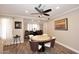 Dining room with round table and four chairs, hardwood floor at 3502 N 22 St, Phoenix, AZ 85016