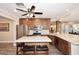 Kitchen island with seating and granite countertop at 3502 N 22 St, Phoenix, AZ 85016