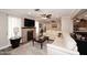 Living room with L-shaped sofa, stone fireplace and hardwood floors at 3502 N 22 St, Phoenix, AZ 85016