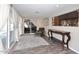 Relaxing sunroom with sliding glass doors, comfy chair, and hardwood floors at 3502 N 22 St, Phoenix, AZ 85016