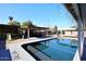 Relaxing pool area with covered patio and volleyball net at 3502 N 22 St, Phoenix, AZ 85016