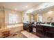 Double vanity bathroom with soaking tub and walk-in shower at 3729 E Donald Dr, Phoenix, AZ 85050