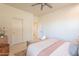 Simple bedroom with queen-size bed and built-in closet at 3729 E Donald Dr, Phoenix, AZ 85050