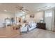 Bright and airy main bedroom with sitting area and large windows at 3729 E Donald Dr, Phoenix, AZ 85050