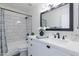 Clean bathroom with white vanity, subway tile, and bathtub at 3930 W Saragosa W St, Chandler, AZ 85226