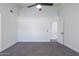 Bright bedroom with gray carpet and ceiling fan at 3930 W Saragosa W St, Chandler, AZ 85226