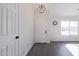 Bright and airy entryway with modern gray flooring and white doors at 3930 W Saragosa W St, Chandler, AZ 85226