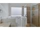 Bathroom with walk-in shower and accessible bathtub at 415 E Glenhaven Dr, Phoenix, AZ 85048