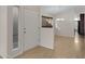 Bright entryway with hardwood floors and view to dining area at 415 E Glenhaven Dr, Phoenix, AZ 85048