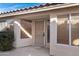 Front door entrance with security door and sidelights at 415 E Glenhaven Dr, Phoenix, AZ 85048