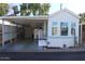 Mobile home with carport and storage shed at 4220 E Main St # F-45, Mesa, AZ 85205