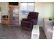 Relaxing living room with recliner and bookcase at 4220 E Main St # F-45, Mesa, AZ 85205